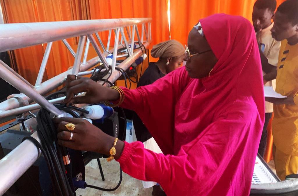 A learner practising stage lighting during a TAFTA Kano session