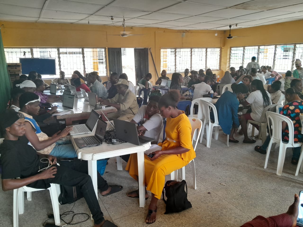 TAFTA Ogun learners working on laptops during a training session